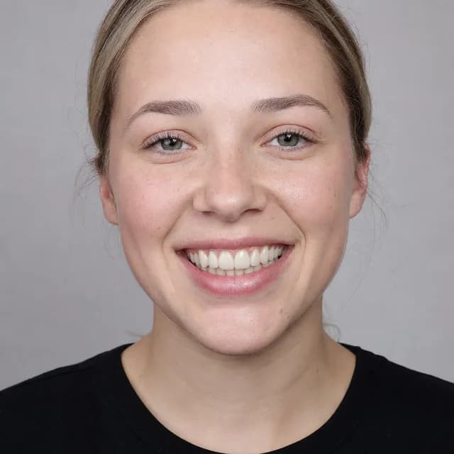 The same example portrait with a brighter, even smile