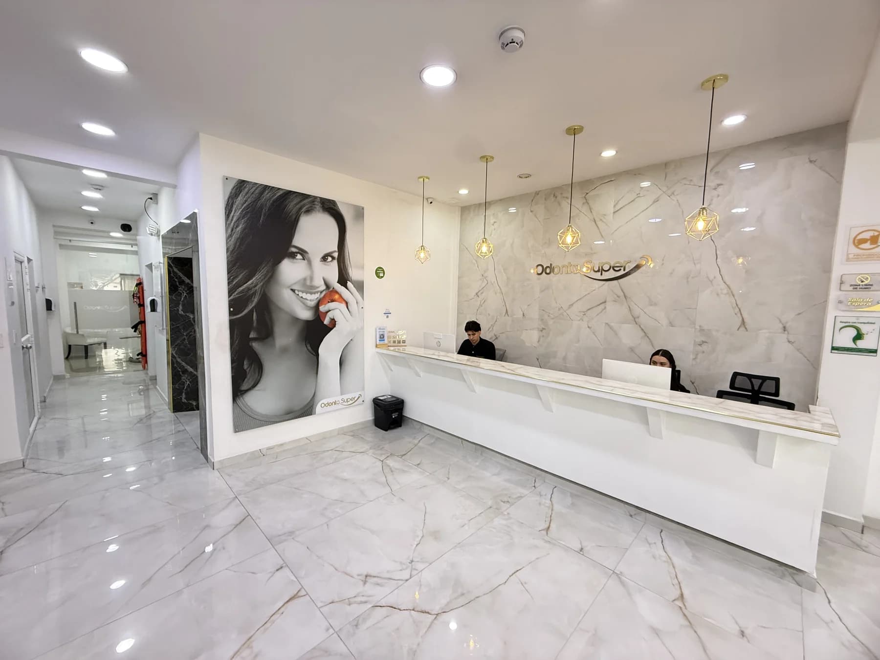 Reception at our Medellín clinic, Odontológica Súper. This image shows the facility, not an implant procedure or result.
