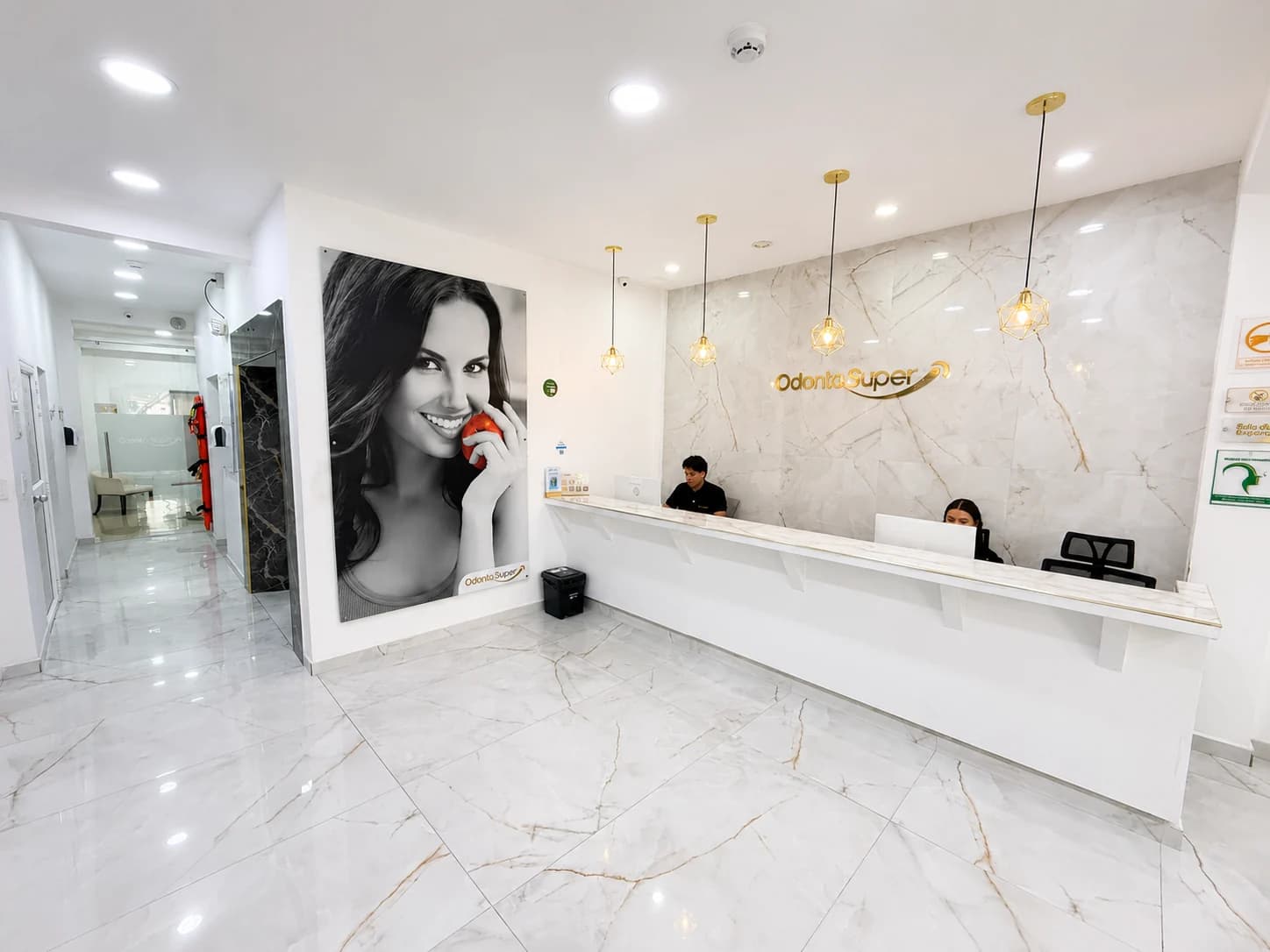 Reception at our Medellín clinic, Odontológica Súper. This image shows the facility, not an implant procedure or result.