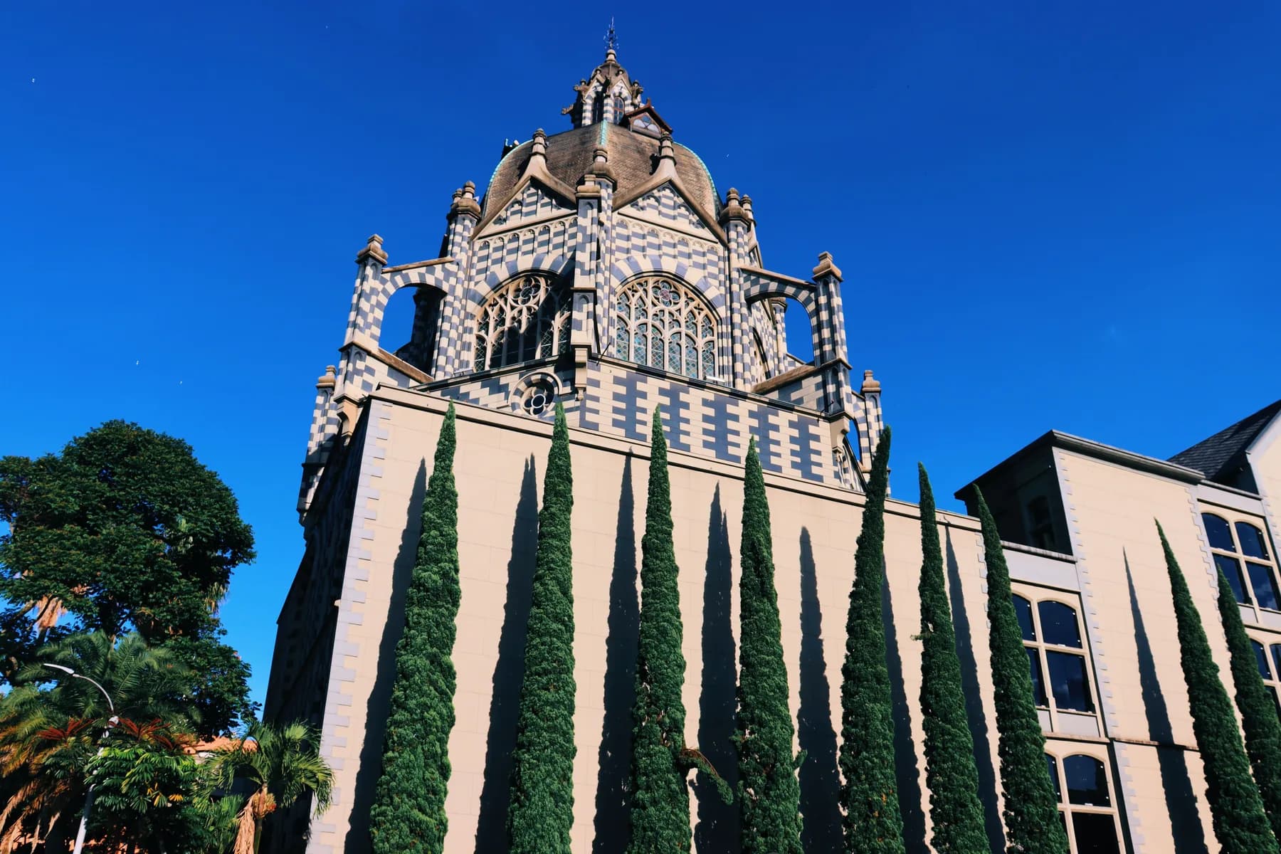 The checkered dome and facade of Palacio de la Cultura Rafael Uribe Uribe in Medellín, Colombia.