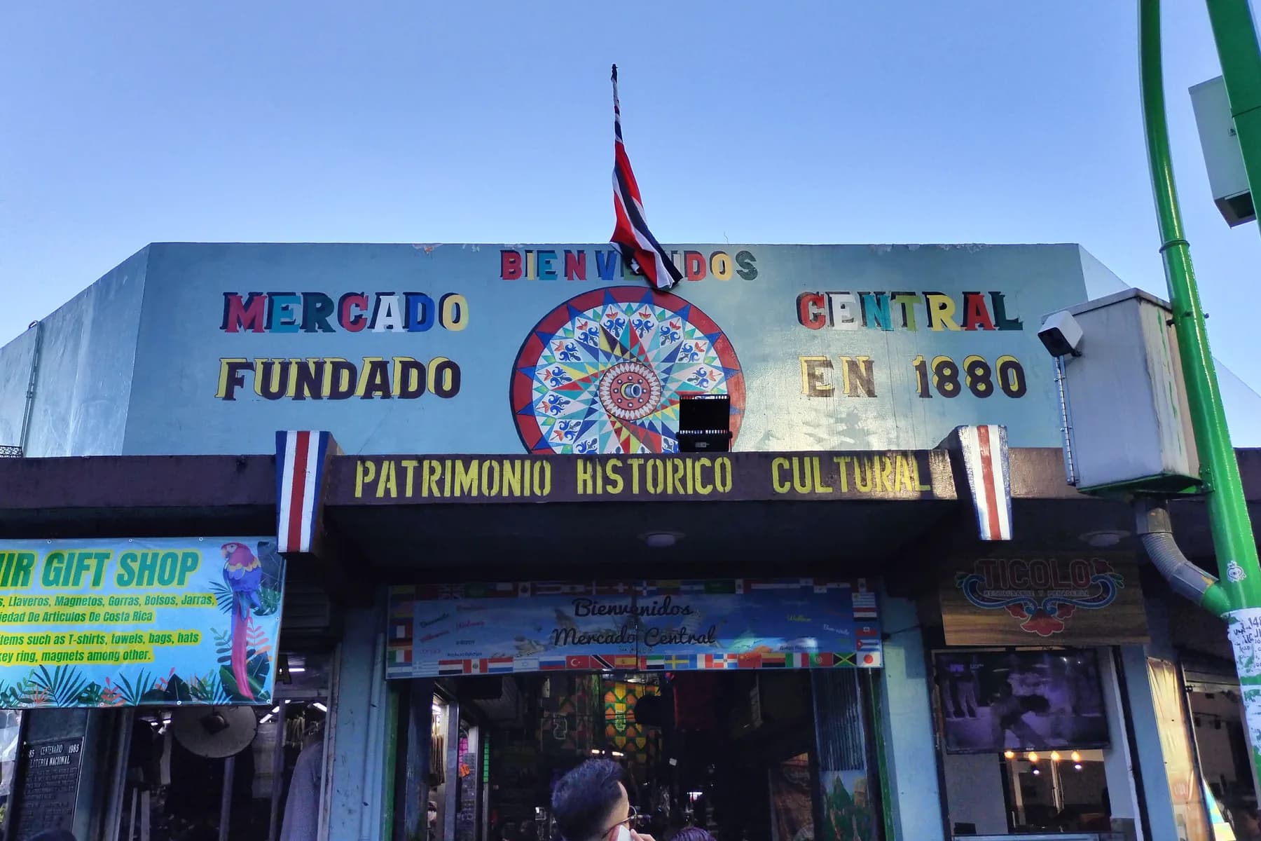 The entrance to San José Central Market with its historic painted sign above the storefront.