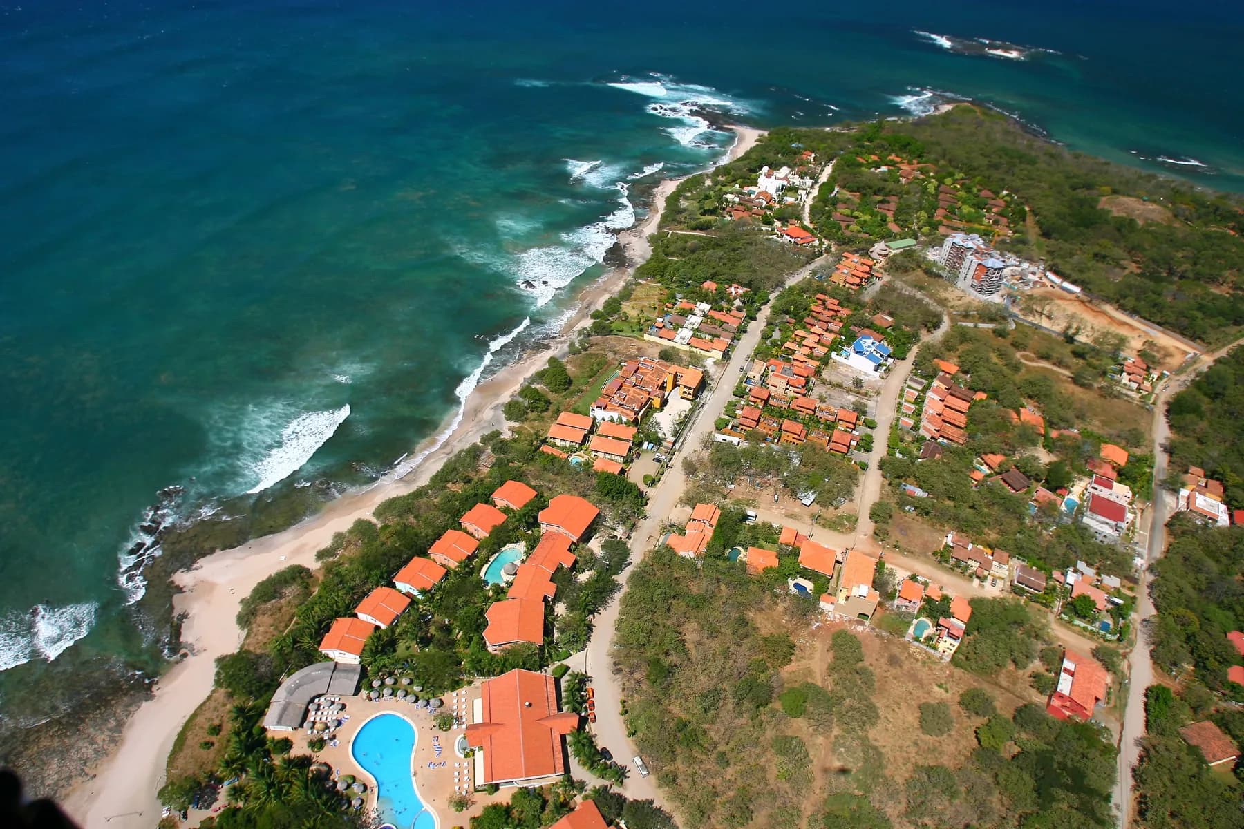 An aerial view of Playa Langosta and the Tamarindo district along Costa Rica’s Pacific coast.