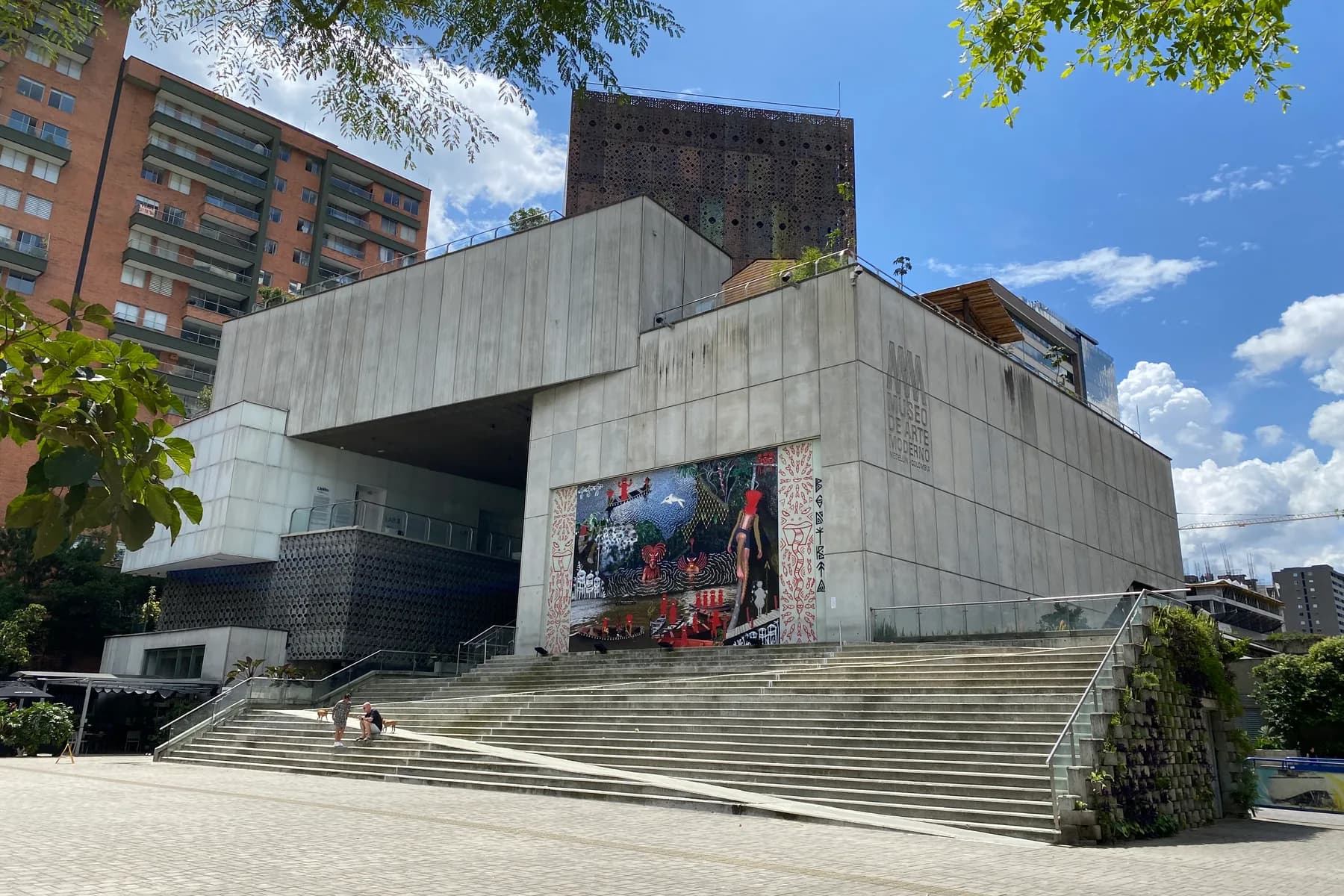 Concrete expansion of the Museo de Arte Moderno de Medellín and its public stairs in Ciudad del Río, Medellín.