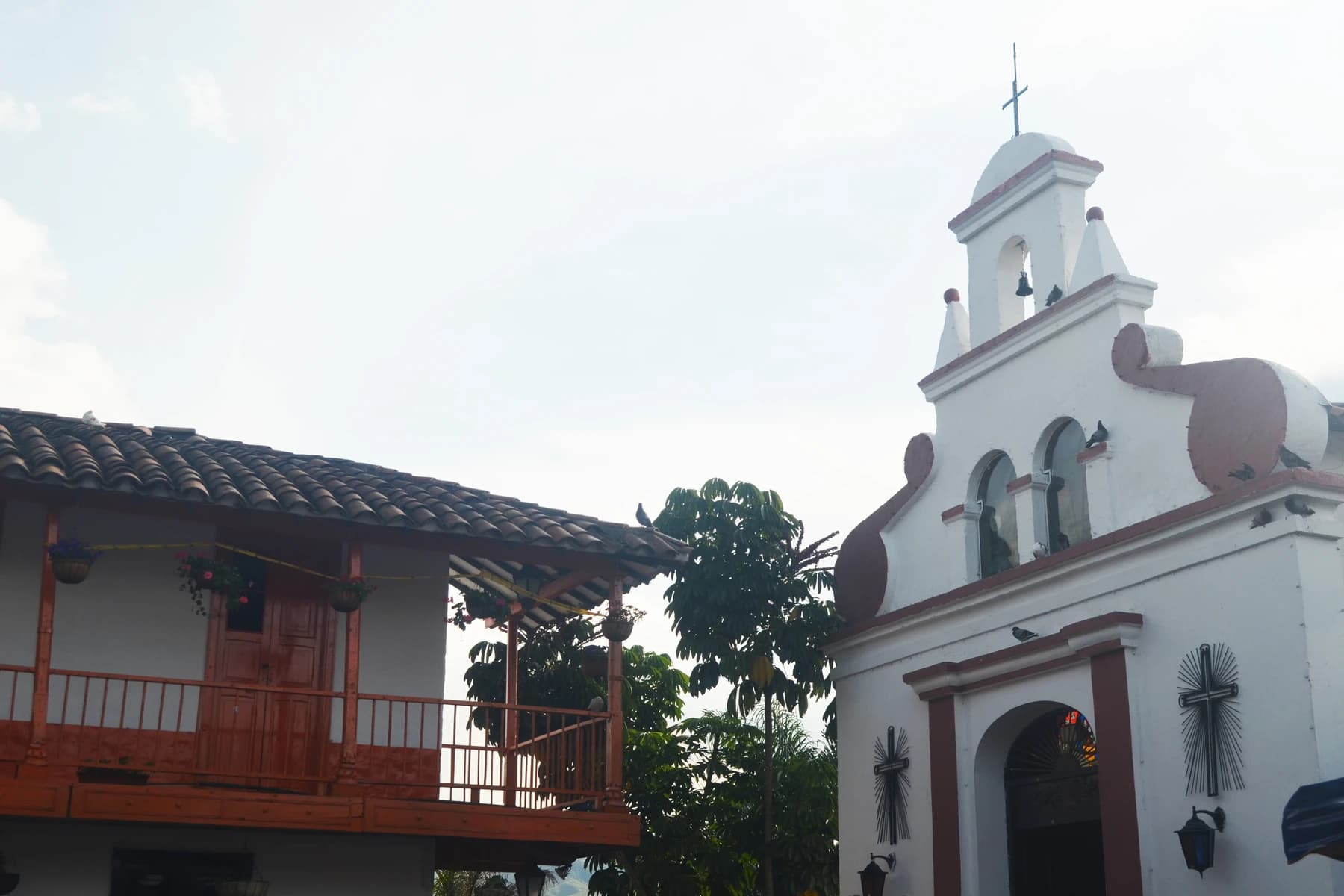 Chapel and balconied house of Pueblito Paisa in Belén, Medellín.