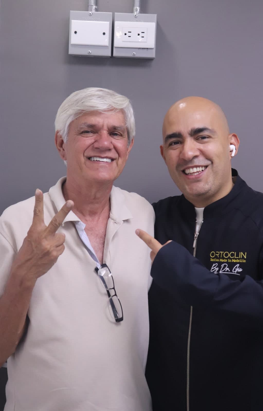 Dr. Gio with a patient at the clinic